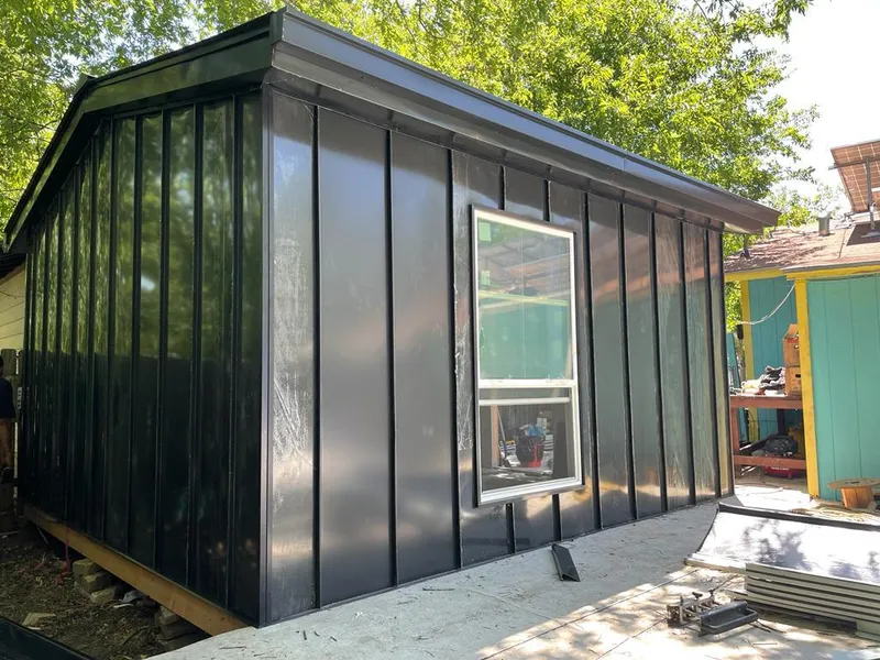 Black standing seam metal wall panels for Roof Inspection in Raton